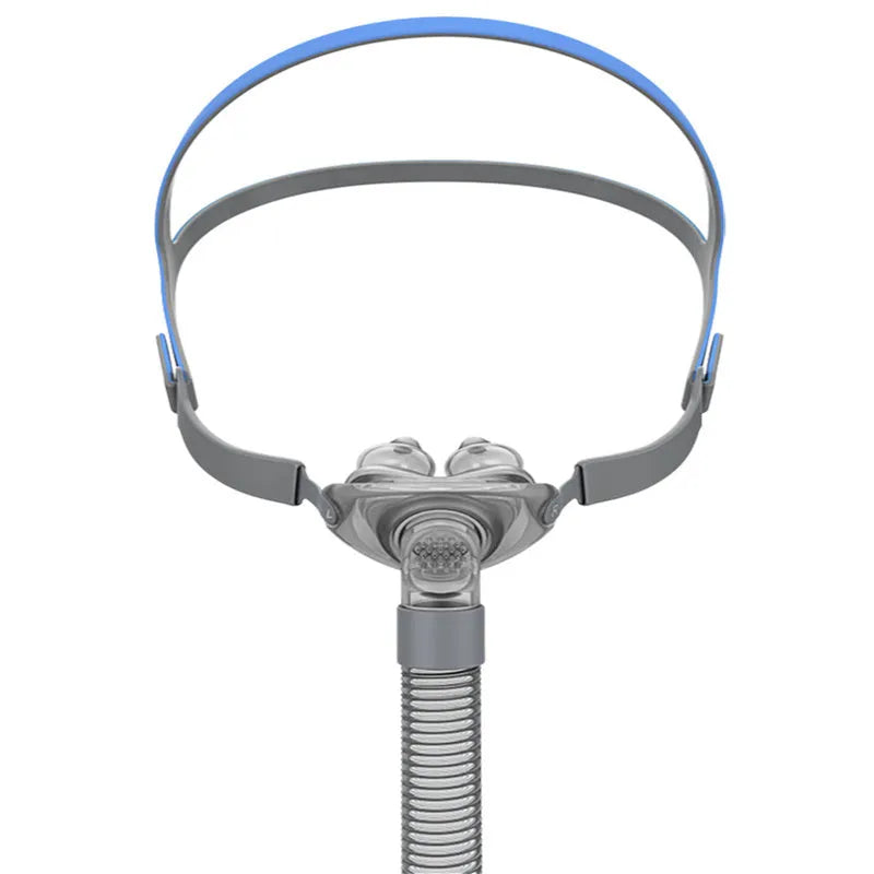CPAP nasal pillow mask with silicone cushions and adjustable headband for sleep apnoea therapy
