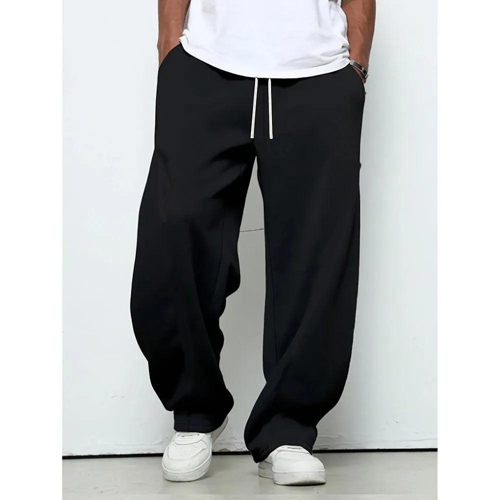 Men's straight-leg casual trousers in black with a micro-elastic waistband and drawstring