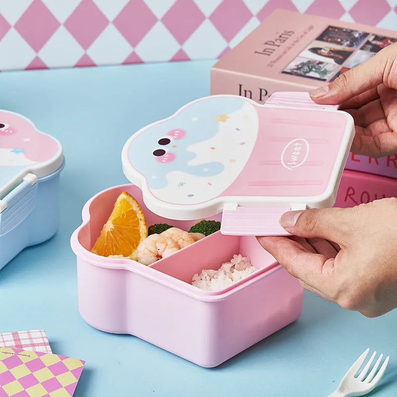 Pink and blue creative ice cream shaped plastic lunch boxes with spoons and forks on a plain background.