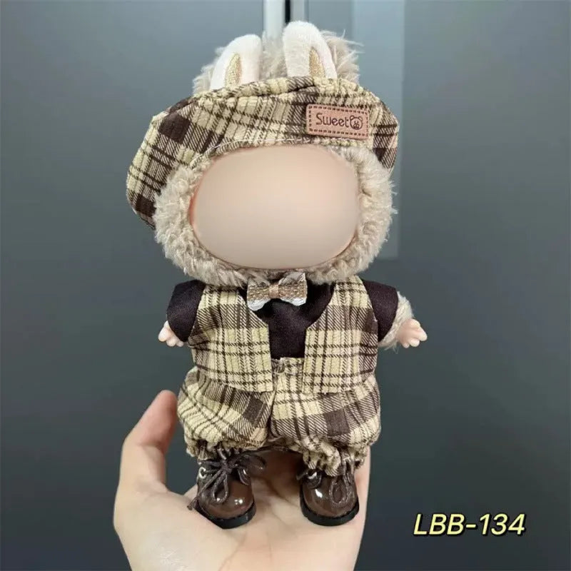 Plastic doll clothes for a 17cm tall vinyl figure on a white background.
