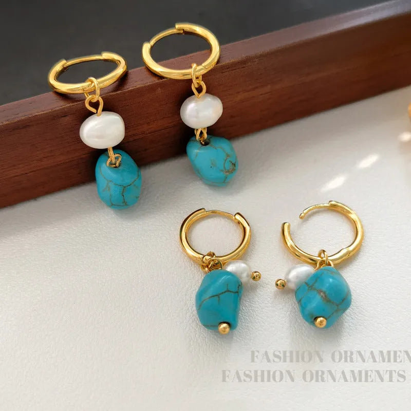 A pair of long and a pair of short geometric copper ear clips with turquoise and cultured pearls.