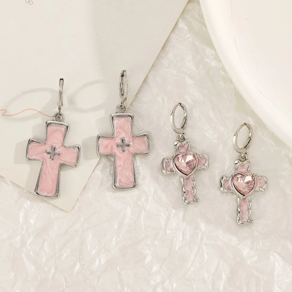 Women's alloy drop earrings showing cross, heart, and animal designs in five colour finishes