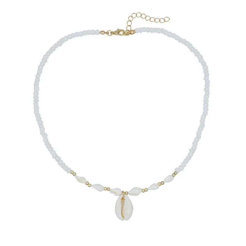 White electroplated conch shell pendant necklace on a regular chain for women.