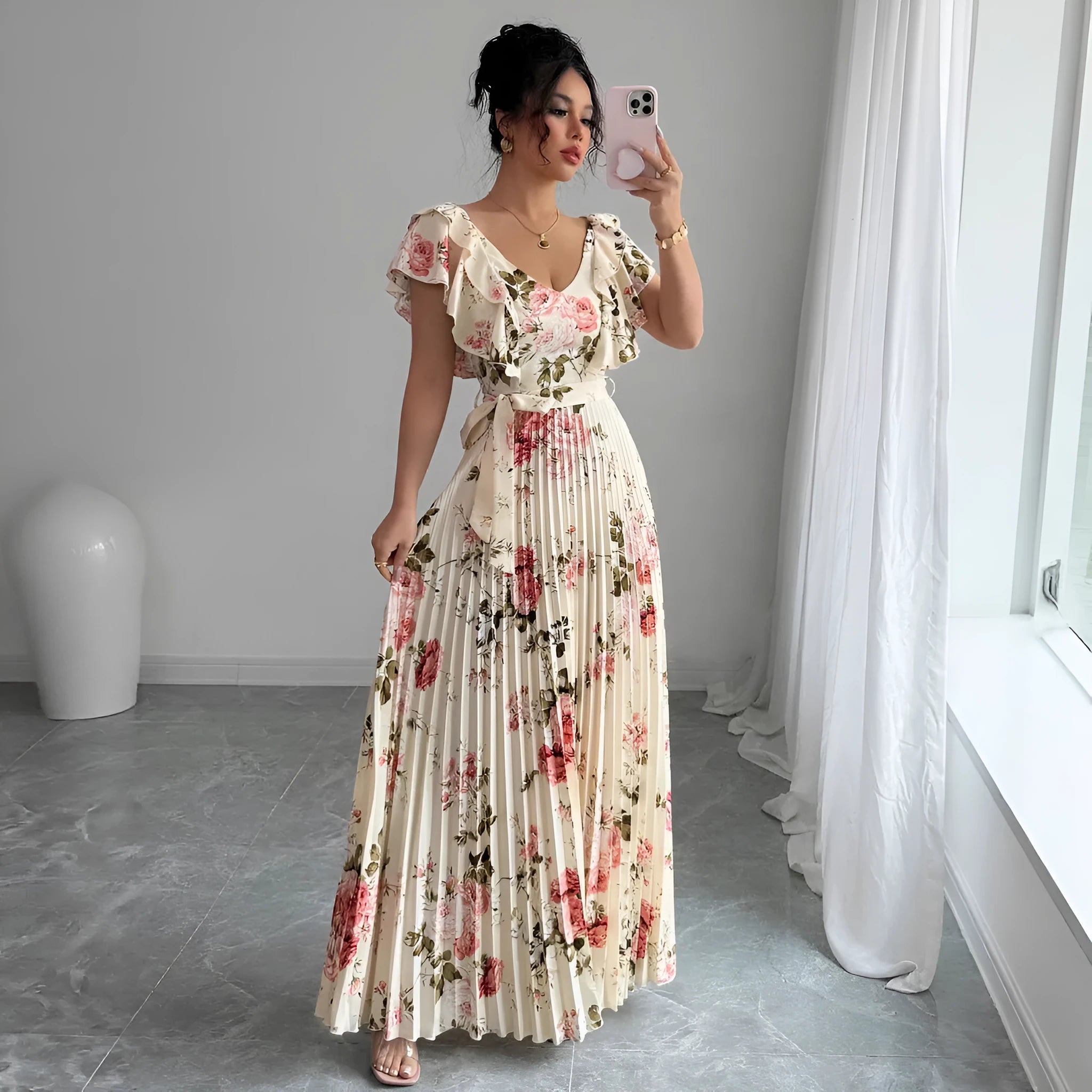 Apricot coloured V-neck floral print dress with ruffled sleeves and an oversized swing skirt