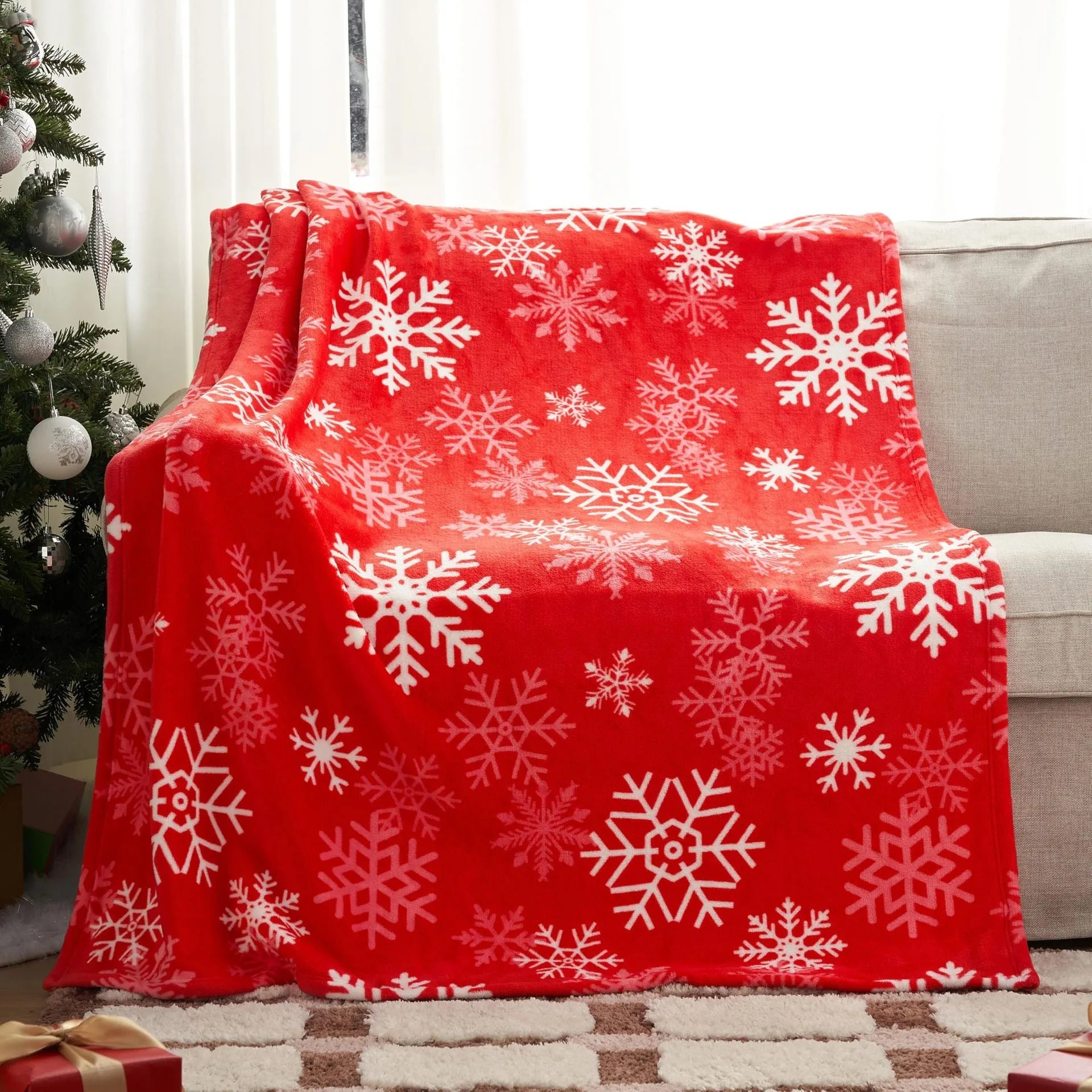 A soft, plush Christmas blanket made from polyester fibre, shown in an American style, folded to display its texture.