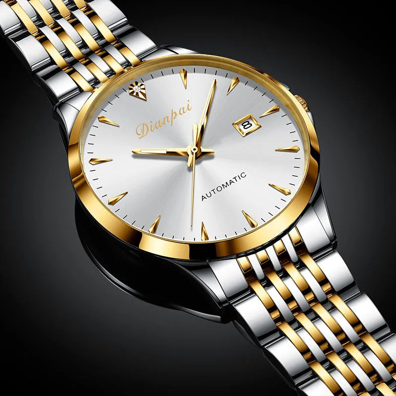 Men's simple dial automatic watch with stainless steel strap on wrist.