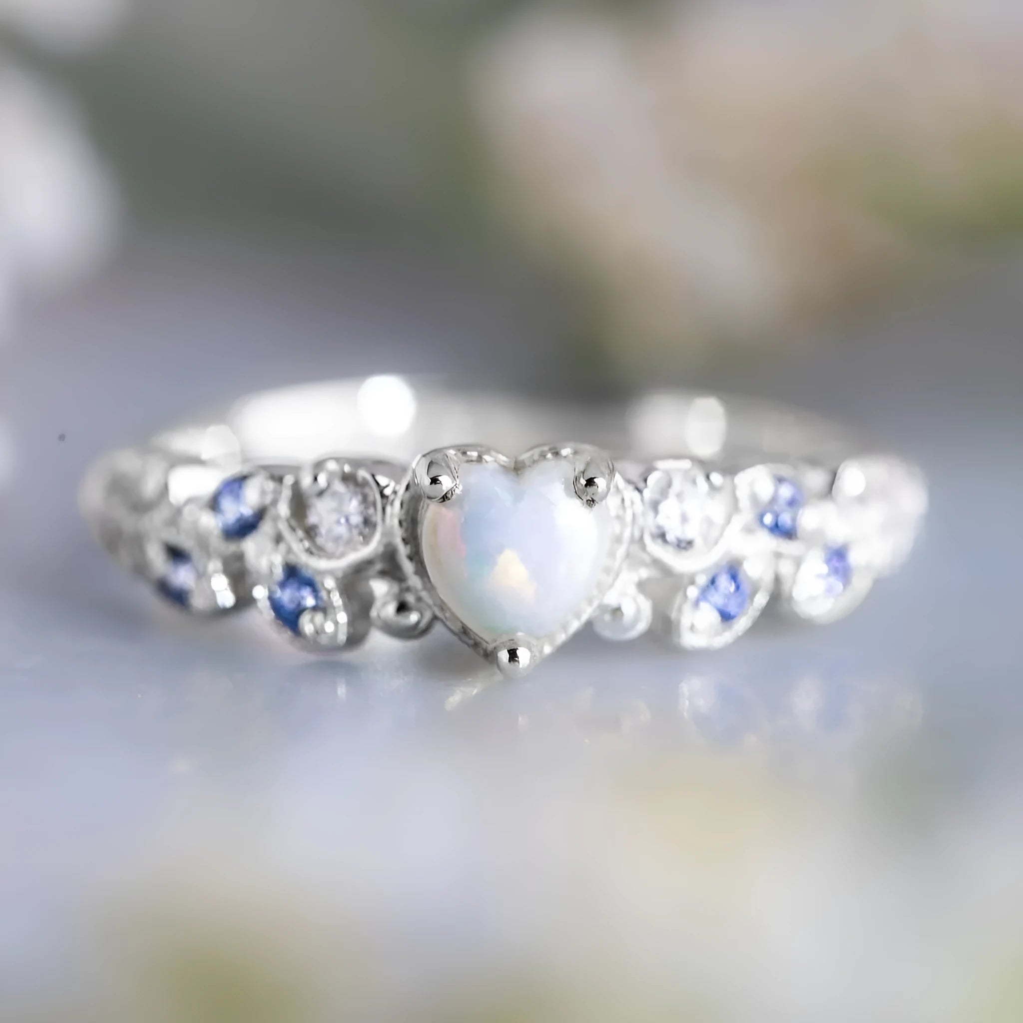 Peach-coloured alloy heart ring for women featuring a detailed floral and opal ocean design.