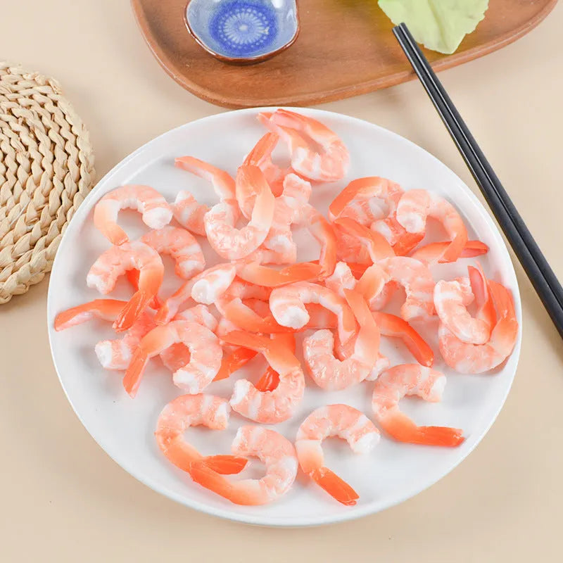 PVC injection moulded shrimp-shaped keychain with door buckle attachment measuring 1.5cm thick