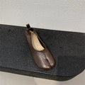 Women's apricot chunky heel pumps with split toe and horseshoe peas detail, round toe, low heel