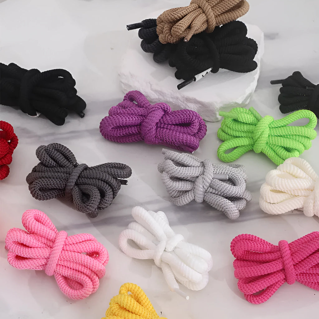 Oval shoelace adapter rope in multiple colours, showing 1.0 cm width and length options for sweatshirts and hats.