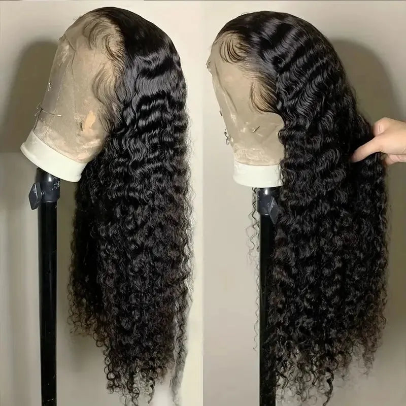 A woman wearing a long curly black synthetic lace wig with side bangs in a small roll wound tube Afro style.