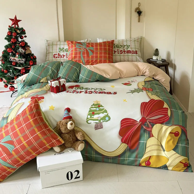 Christmas cartoon printed duvet cover and pillowcases on a bed, showing Gingerbread Man pattern.