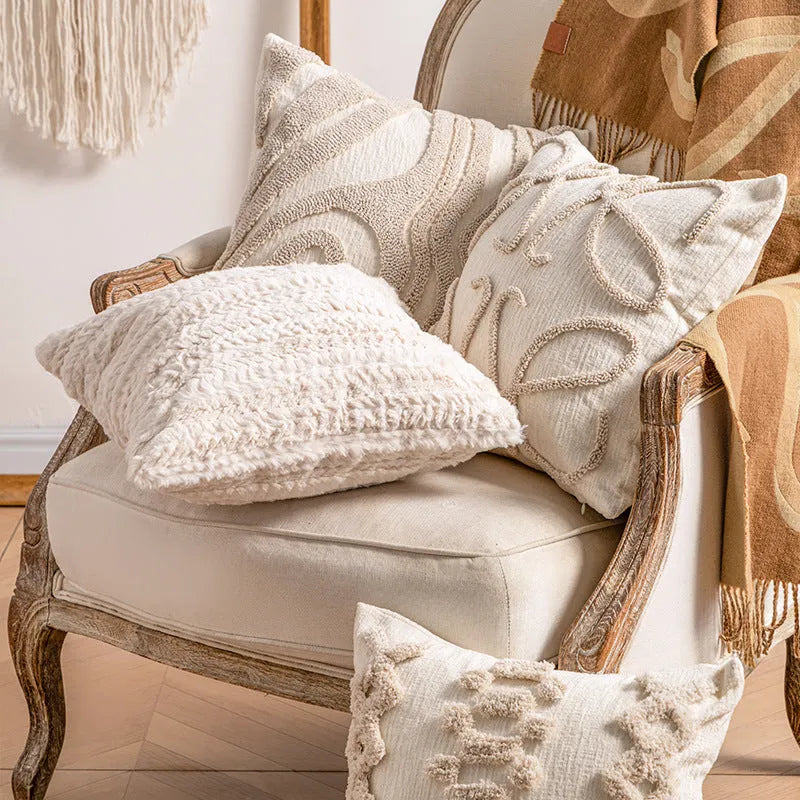 Knitted pillow cover with tassel fringe in striped pattern