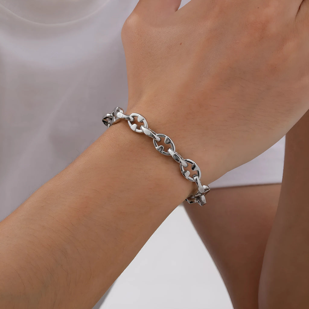 Men's thick stainless steel chain bracelet with geometric links in steel colour.