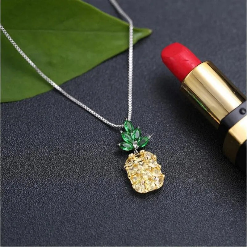 Silver Korean fashion necklace with a geometric pineapple and diamond design pendant.
