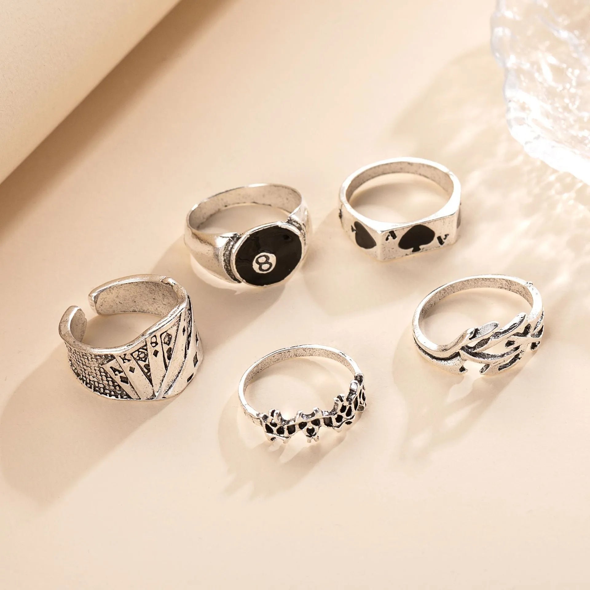 Black alloy poker ring with raised spade card design on band