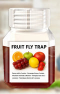 Bottle of SK003 fruit fly bait liquid on a kitchen countertop.