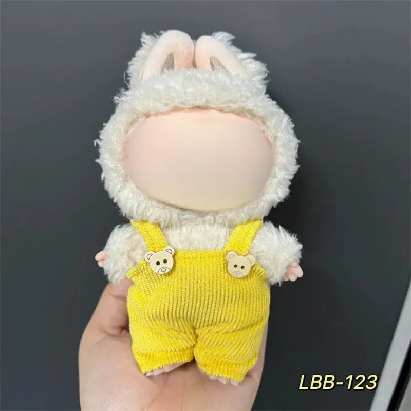 Plastic doll clothes for a 17cm tall vinyl figure on a white background.