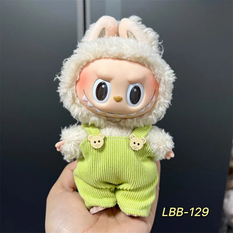 Plastic doll clothes for a 17cm tall vinyl figure on a white background.