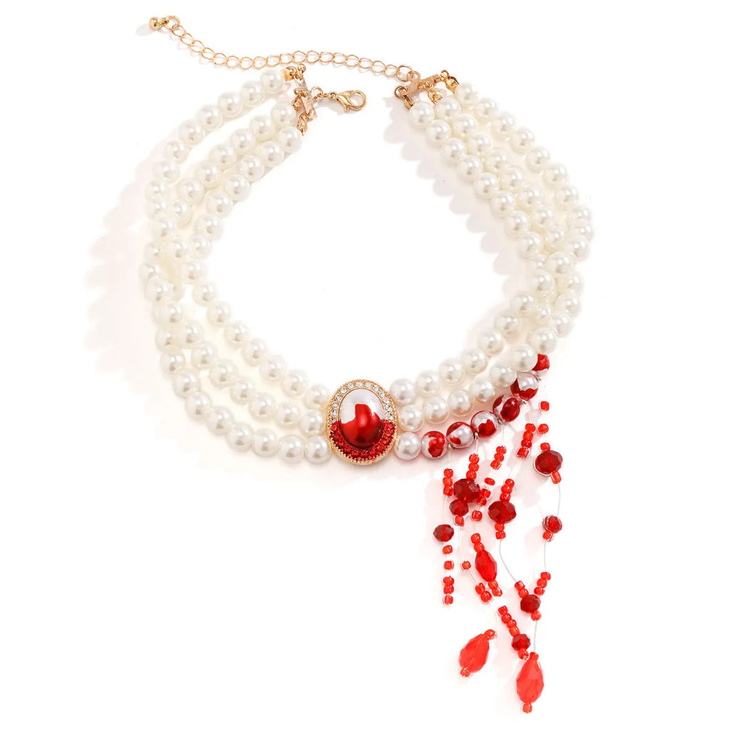 Gothic pearl collar jewellery set with gold electroplated finishes showing necklace, bracelet, and earrings