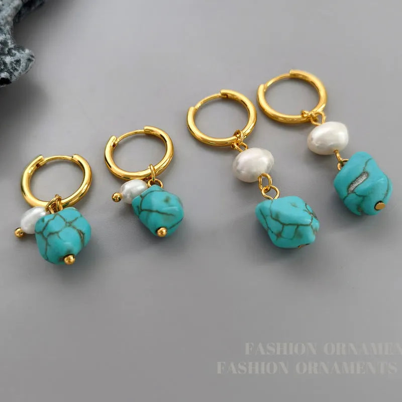 A pair of long and a pair of short geometric copper ear clips with turquoise and cultured pearls.
