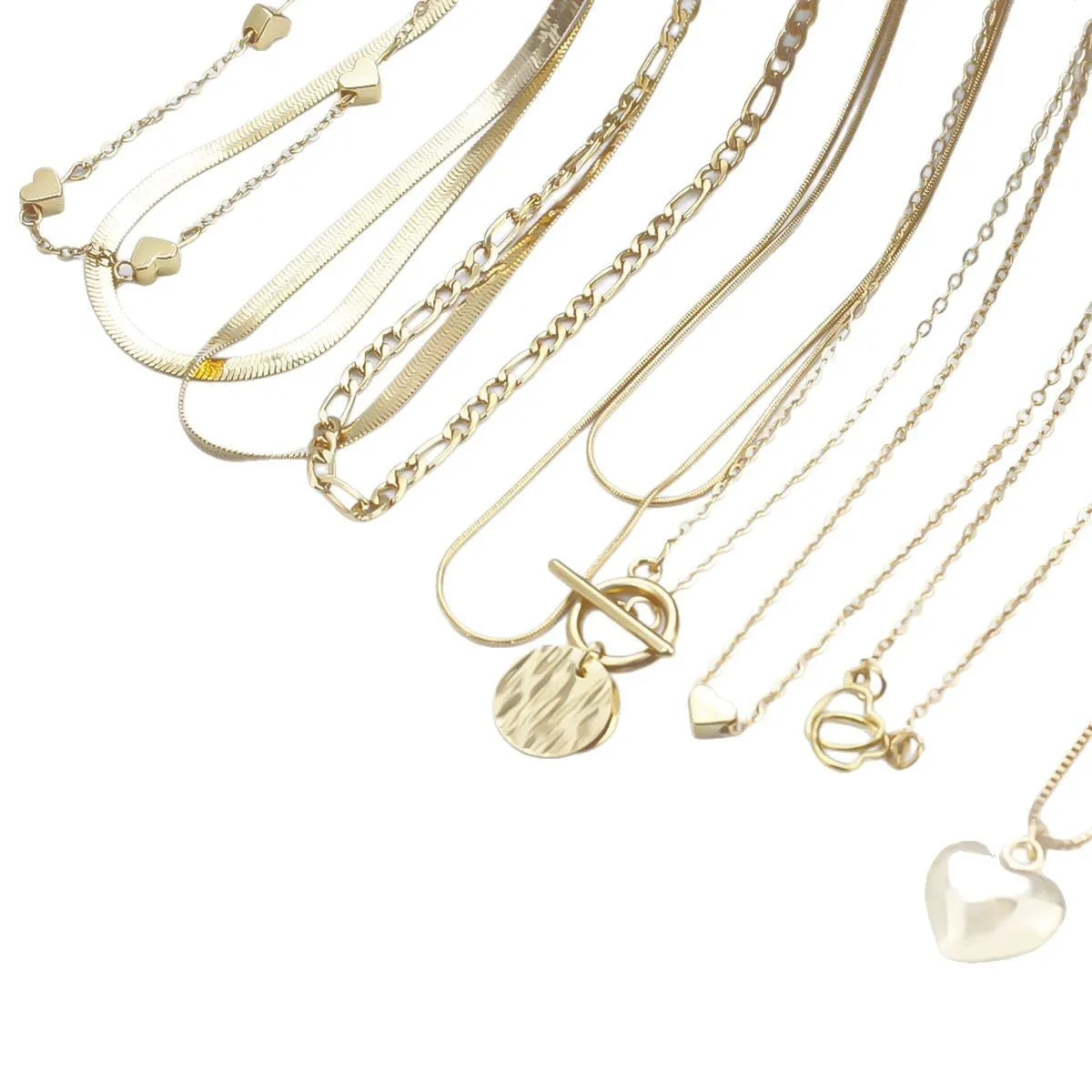 Ten gold electroplated women's necklaces with alloy pendants on snake bones chains