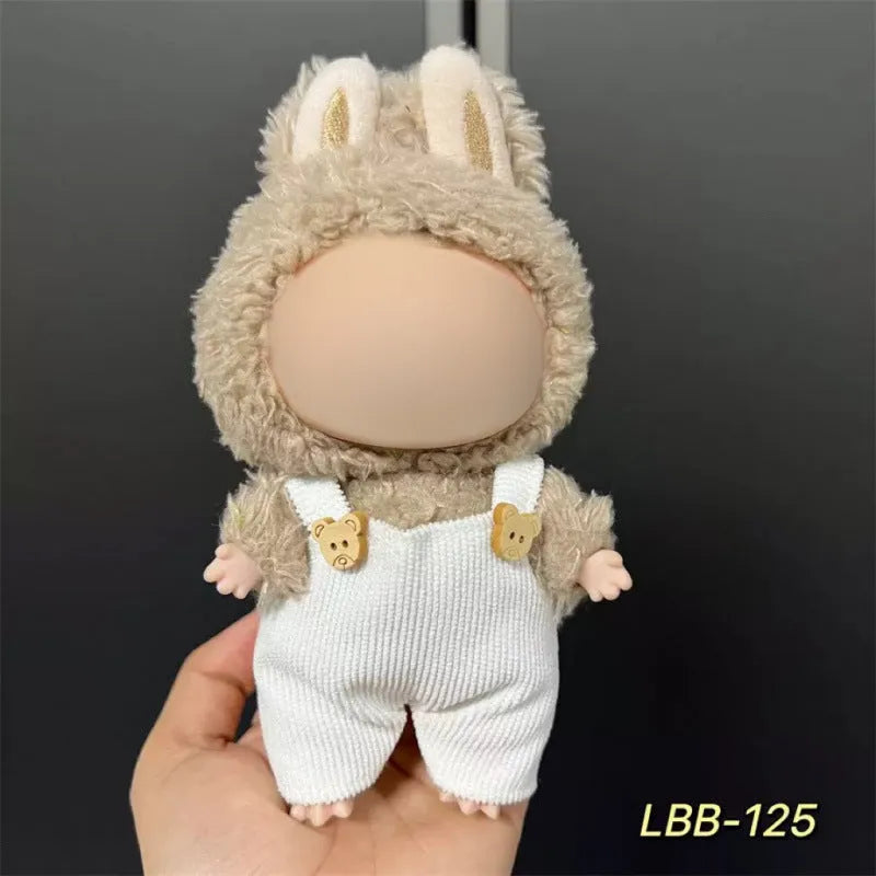 Plastic doll clothes for a 17cm tall vinyl figure on a white background.