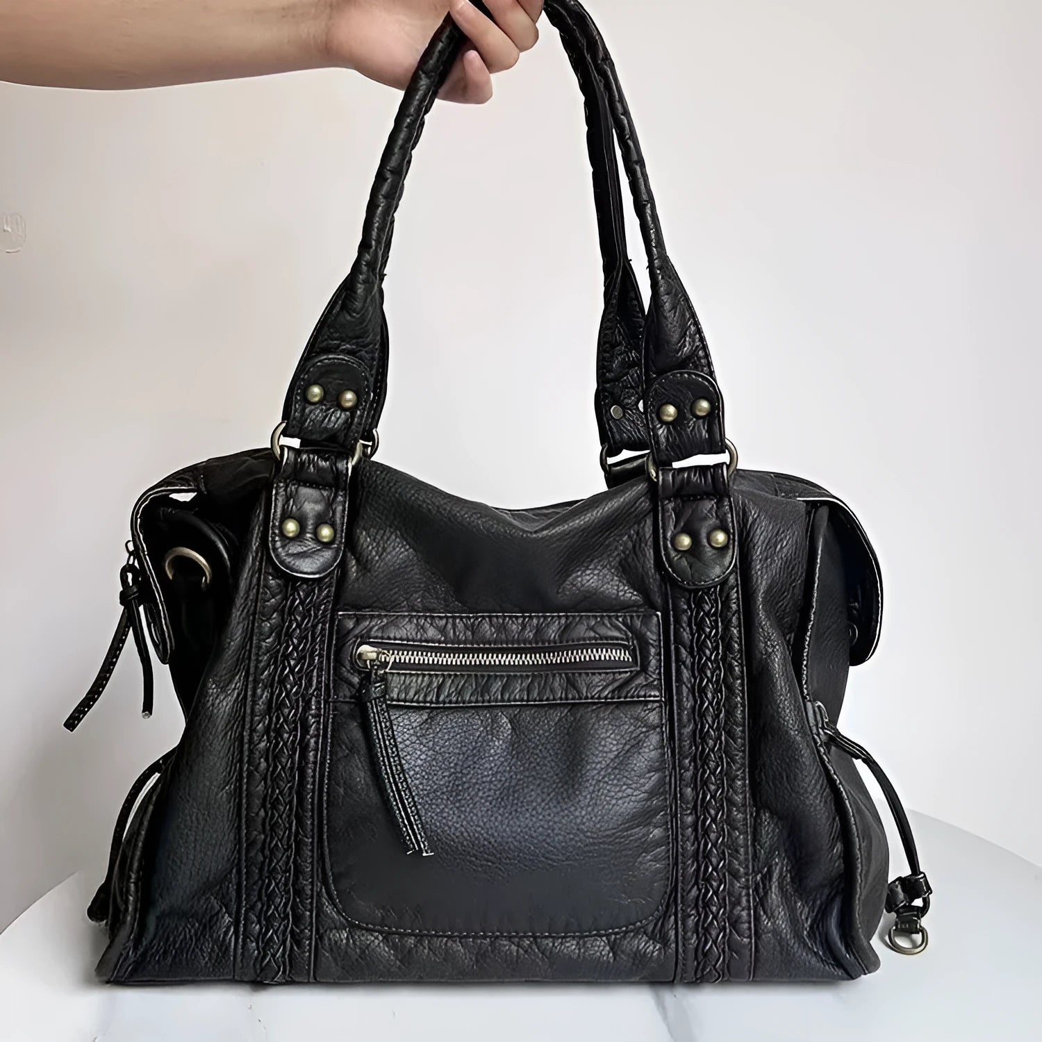 Women's retro motorcycle shoulder messenger bag in brown with weaving design elements and single adjustable strap