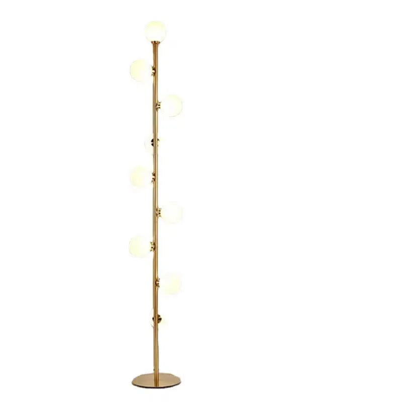 Tall minimalist Nordic floor lamp with wrought iron stem, glass fittings, and a circular white marble base.