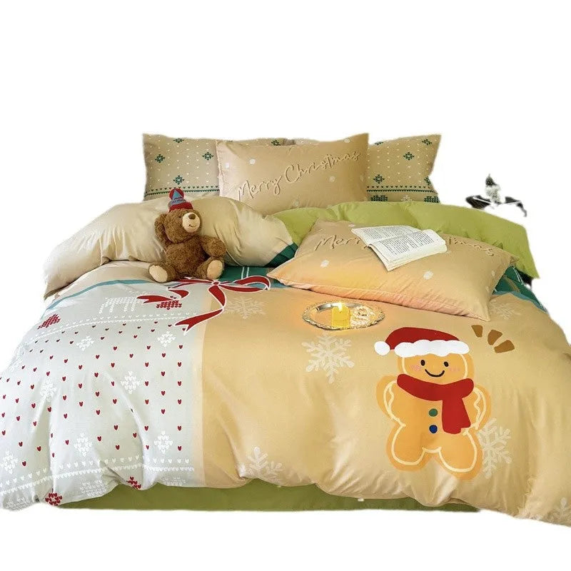 Christmas cartoon printed duvet cover and pillowcases on a bed, showing Gingerbread Man pattern.