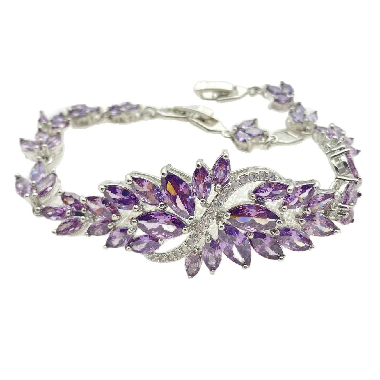 Gold electroplated copper bracelet with coloured zircon stones and ice flower detail.