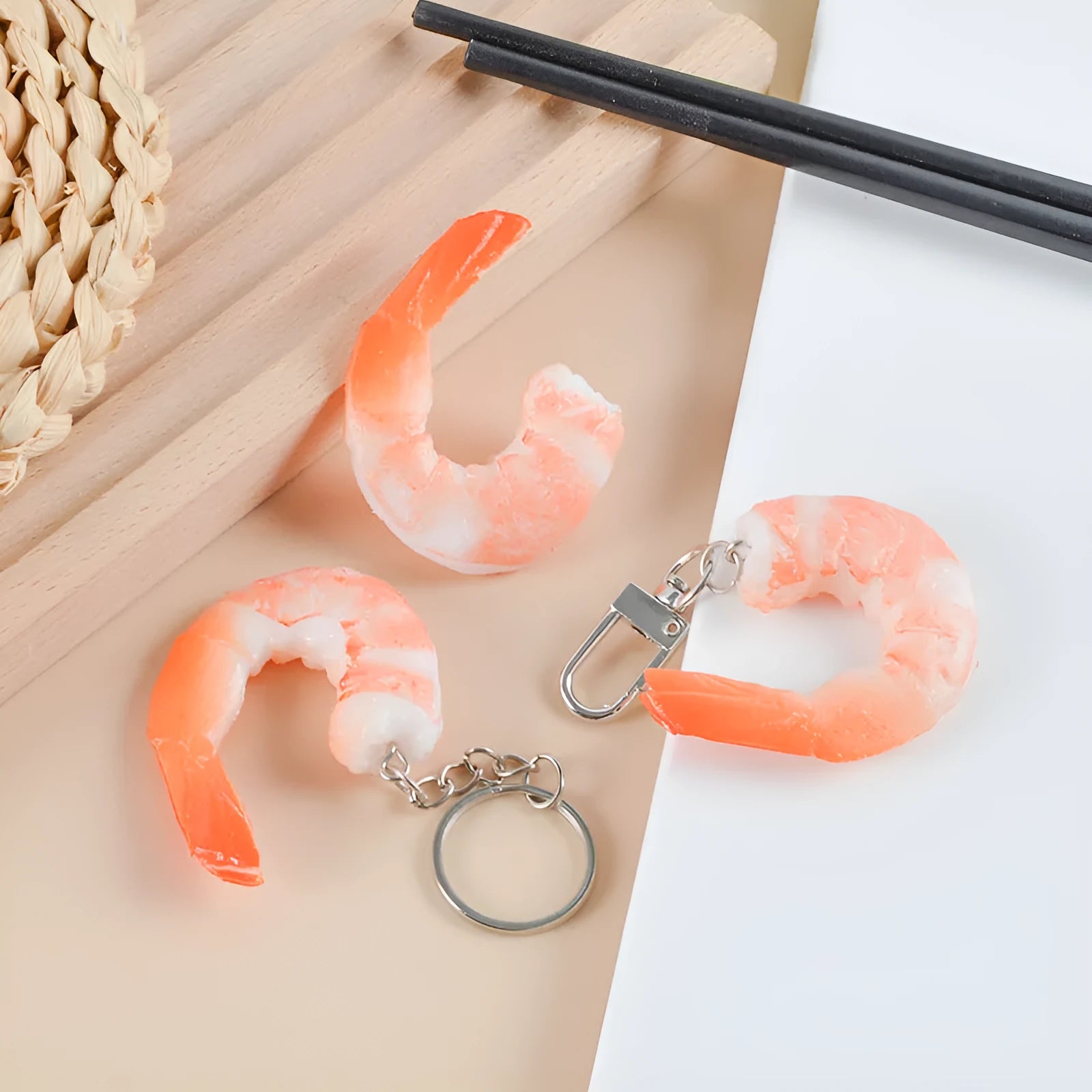 PVC injection moulded shrimp-shaped keychain with door buckle attachment measuring 1.5cm thick