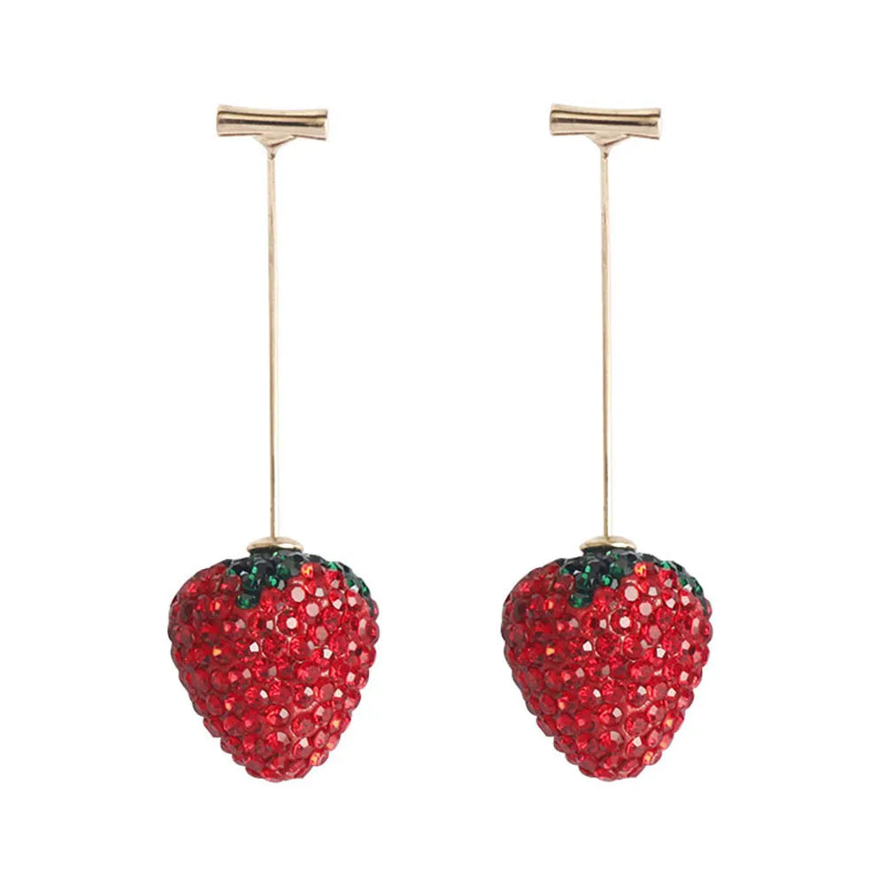 Geometric strawberry shaped zinc alloy earrings with spot drill texture on a red background.