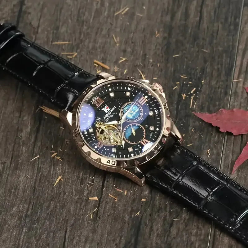 Men's large dial automatic watch with rose gold case, black hollow dial, and transparent back on leather strap.