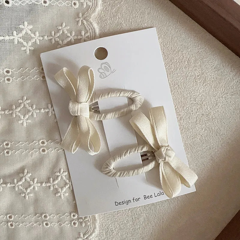 Children's cloth bow barrettes in deciduous colours red pink beige milk tea yellowish brown brown alloy clips