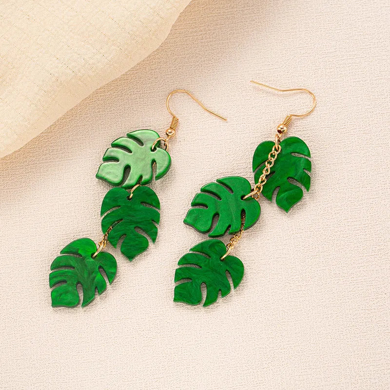 Coloured acrylic artocarpus heterophyllus shaped drop earrings on alloy hooks.