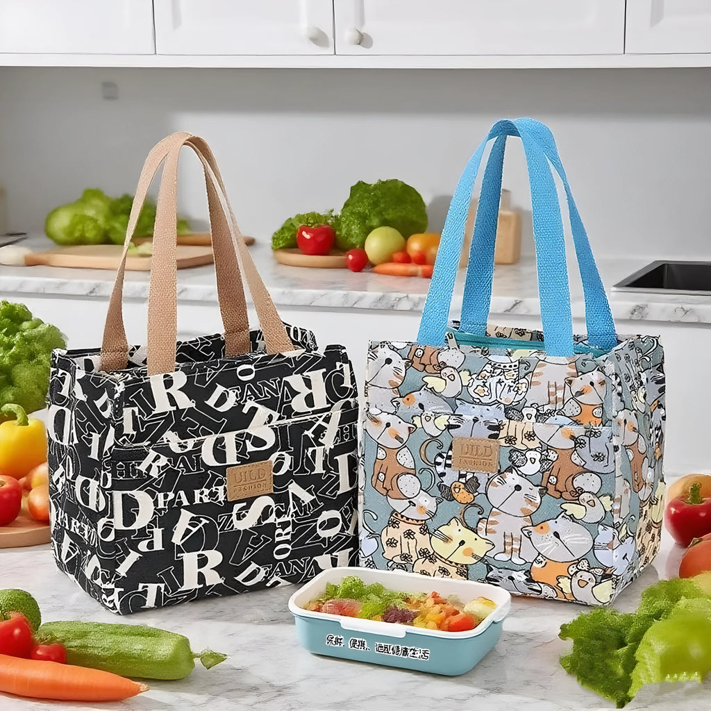Women's large printed canvas tote bag with aluminium handles in a choice of floral and cat designs.
