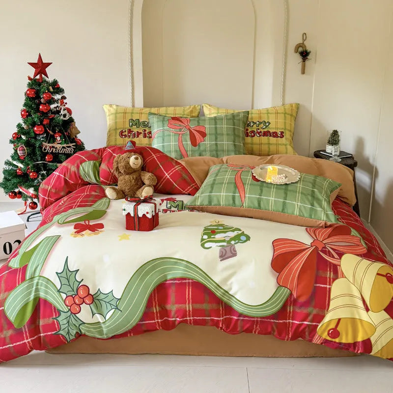 Christmas cartoon printed duvet cover and pillowcases on a bed, showing Gingerbread Man pattern.
