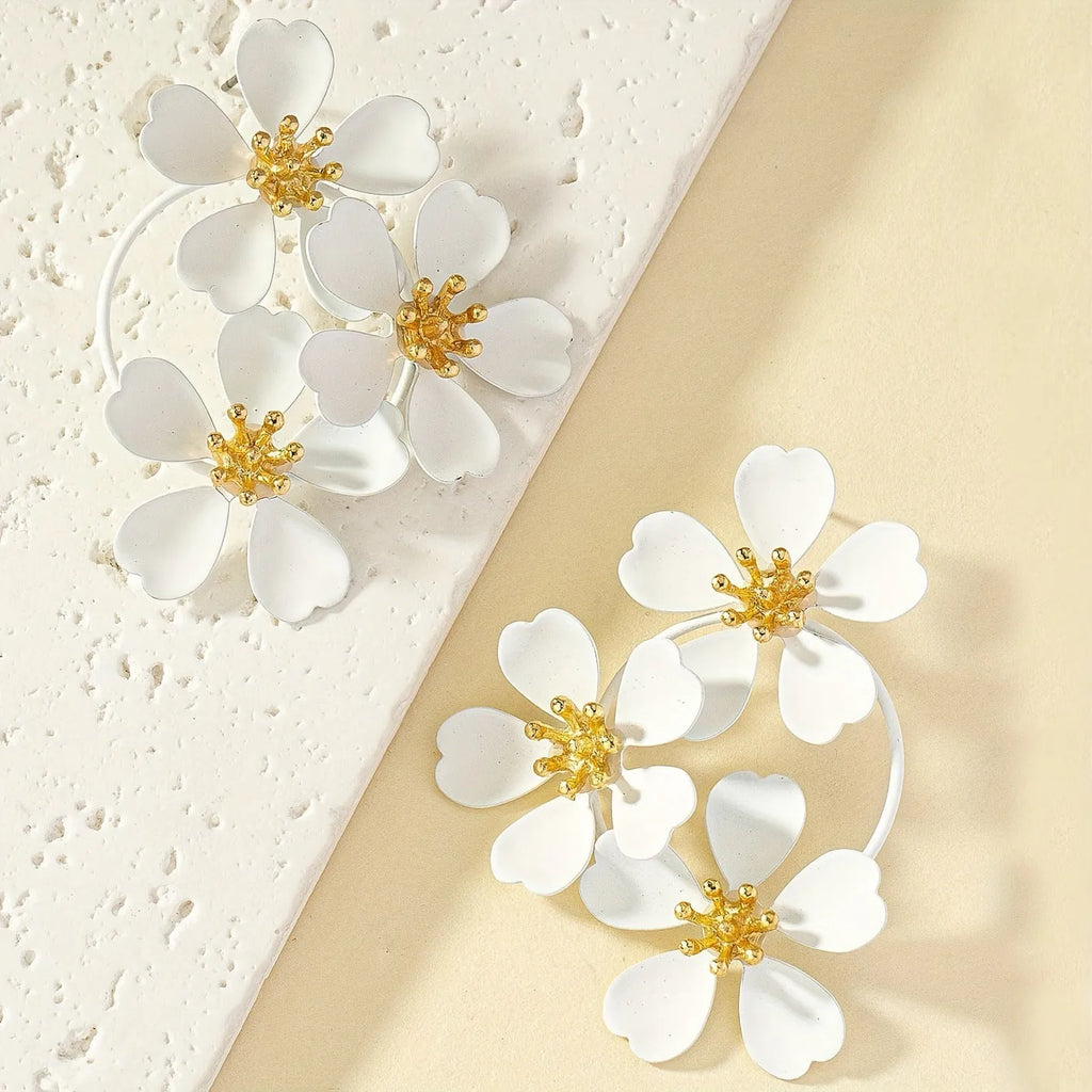 Retro flower-shaped fashion earrings for women in black and white colours with iron construction