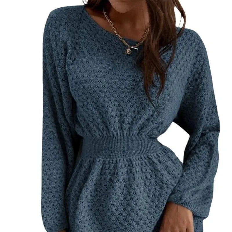 Blue women's knitted dress with hand-crocheted flowers, fitted waist, and 65cm length