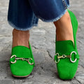 Green suede women's loafers with metal fastener and flat bottom