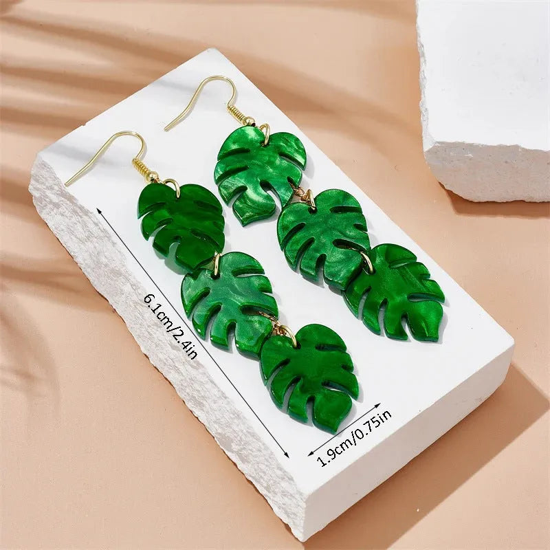 Coloured acrylic artocarpus heterophyllus shaped drop earrings on alloy hooks.