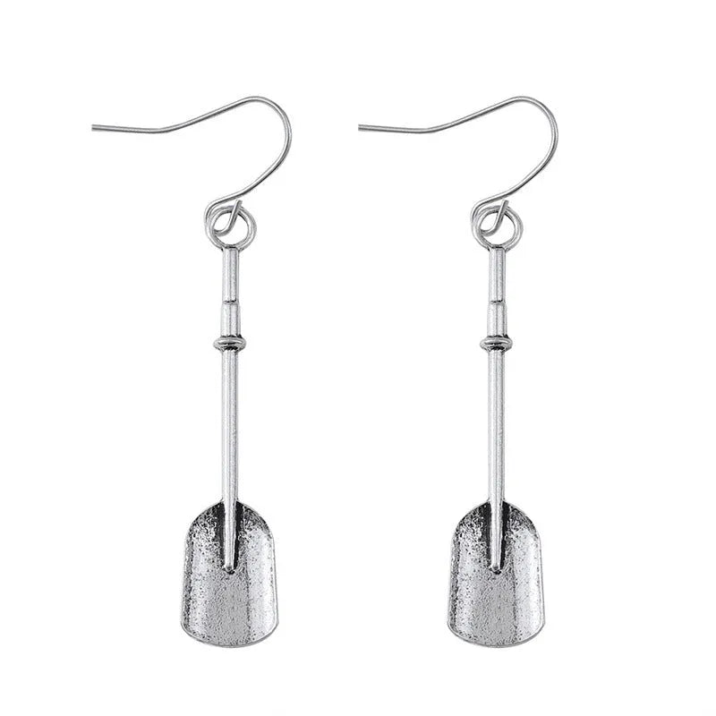 Long antique silver shovel-shaped drop earrings with a geometric retro design.