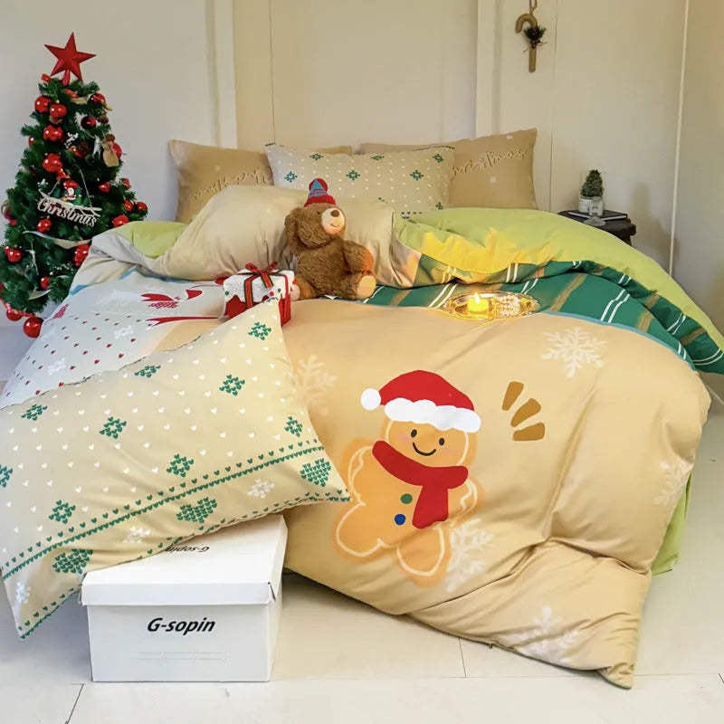 Christmas cartoon printed duvet cover and pillowcases on a bed, showing Gingerbread Man pattern.