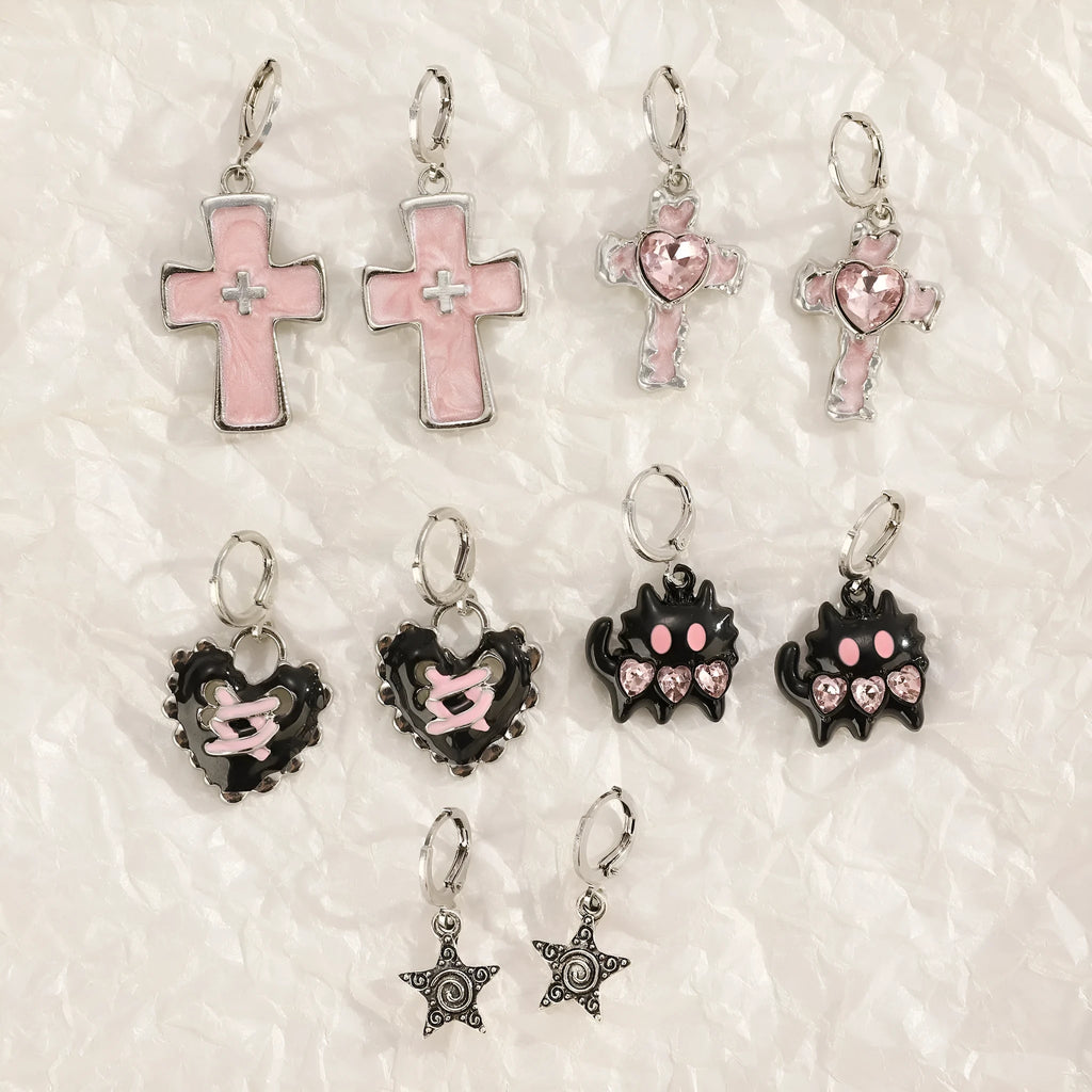 Women's alloy drop earrings showing cross, heart, and animal designs in five colour finishes
