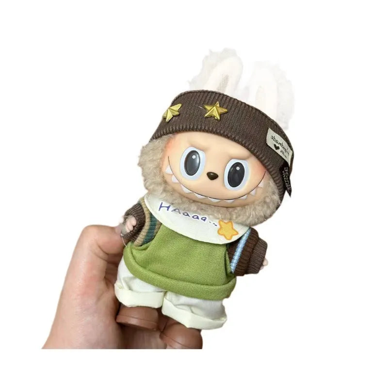Plastic doll clothes for a 17cm tall vinyl figure on a white background.