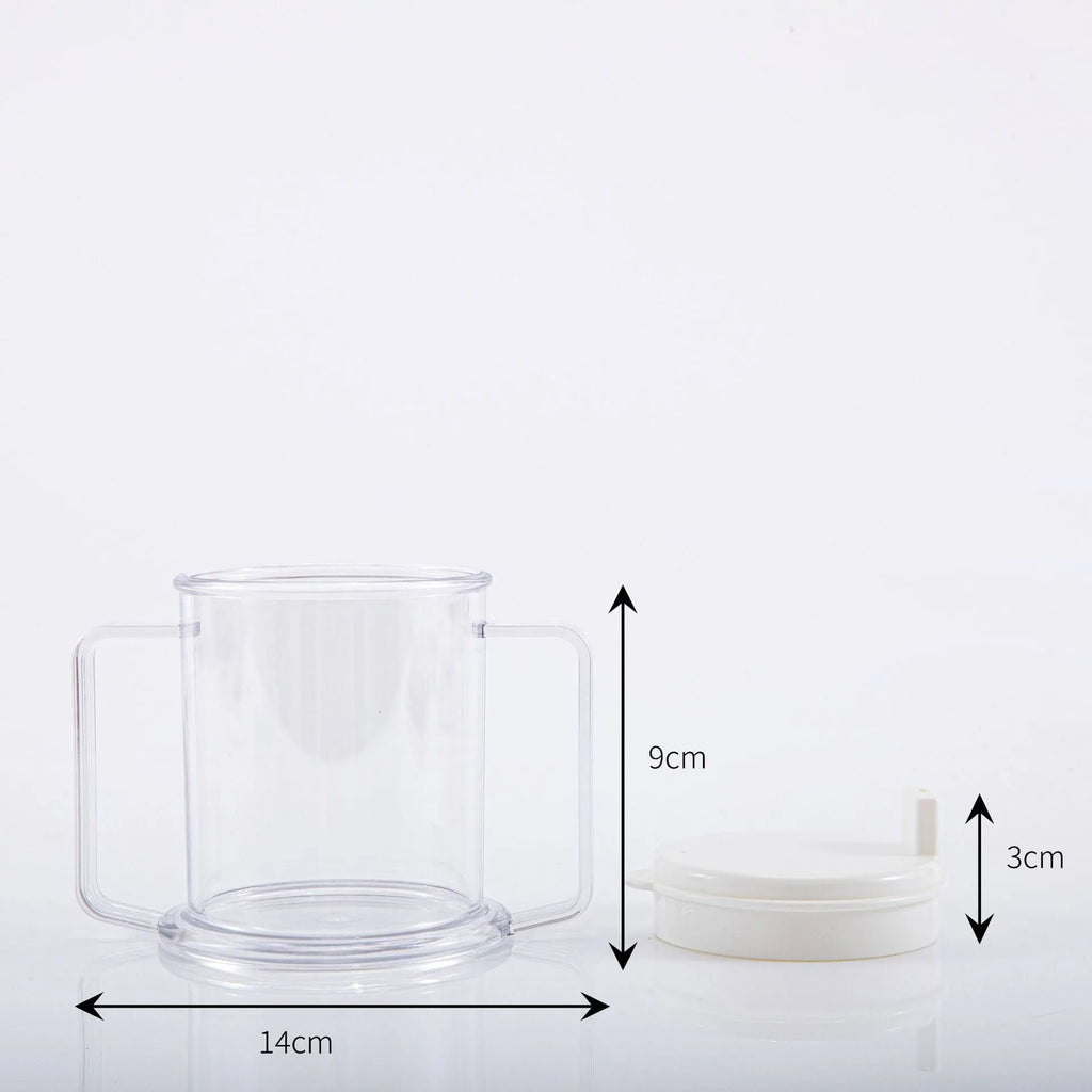 Transparent spill-proof lightweight plastic drinking cup on a table.