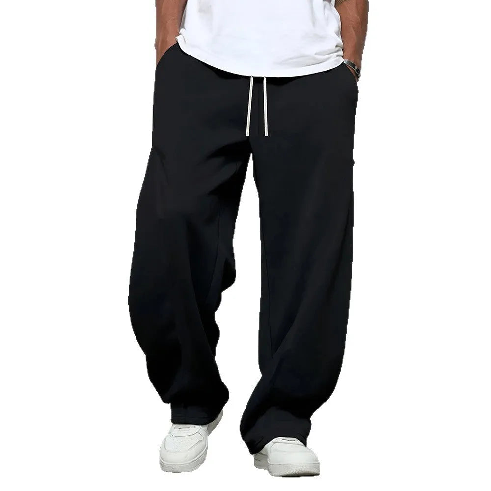 Men's straight-leg casual trousers in black with a micro-elastic waistband and drawstring