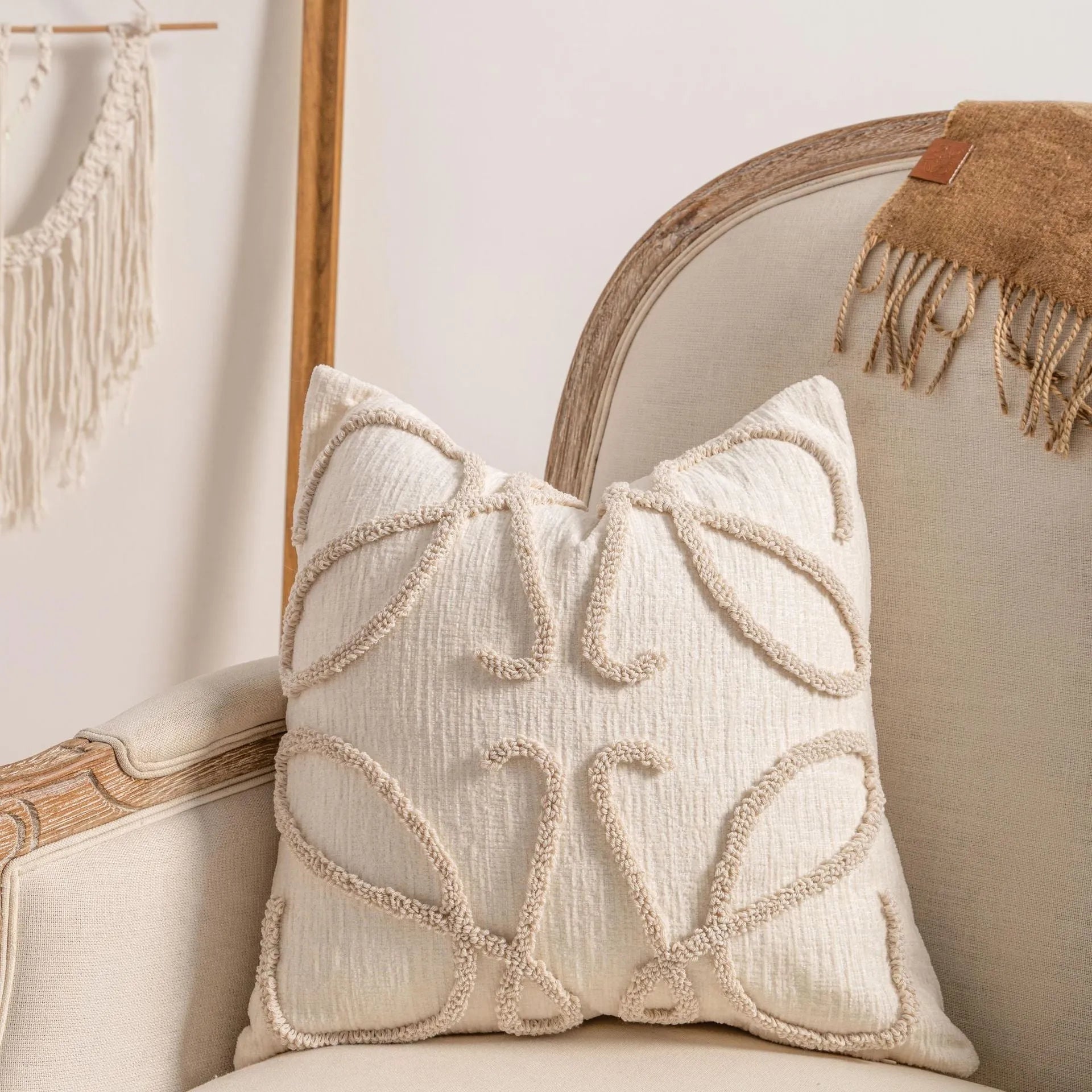 Knitted pillow cover with tassel fringe in striped pattern