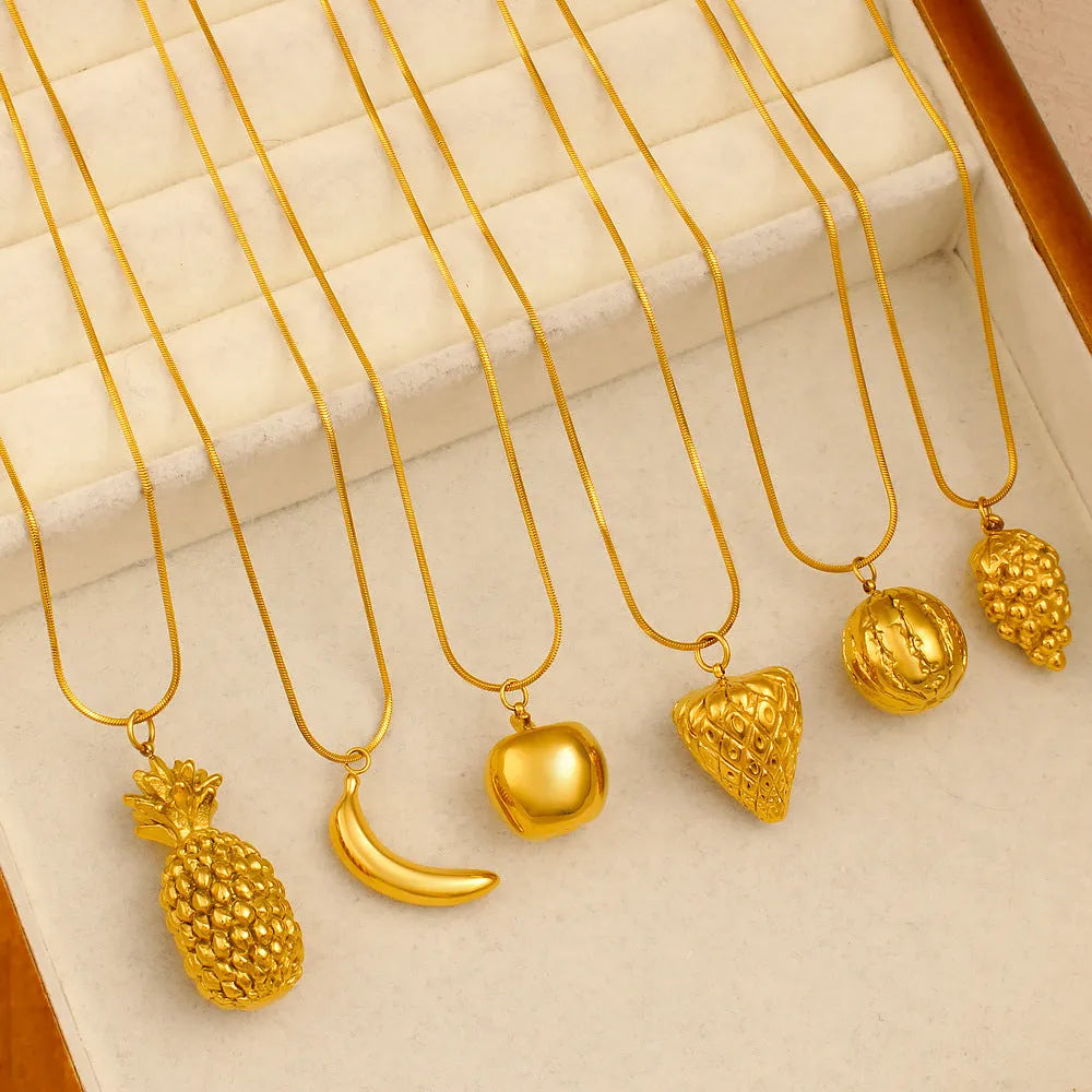 Stainless steel necklace with a detailed alloy fruit charm pendant.